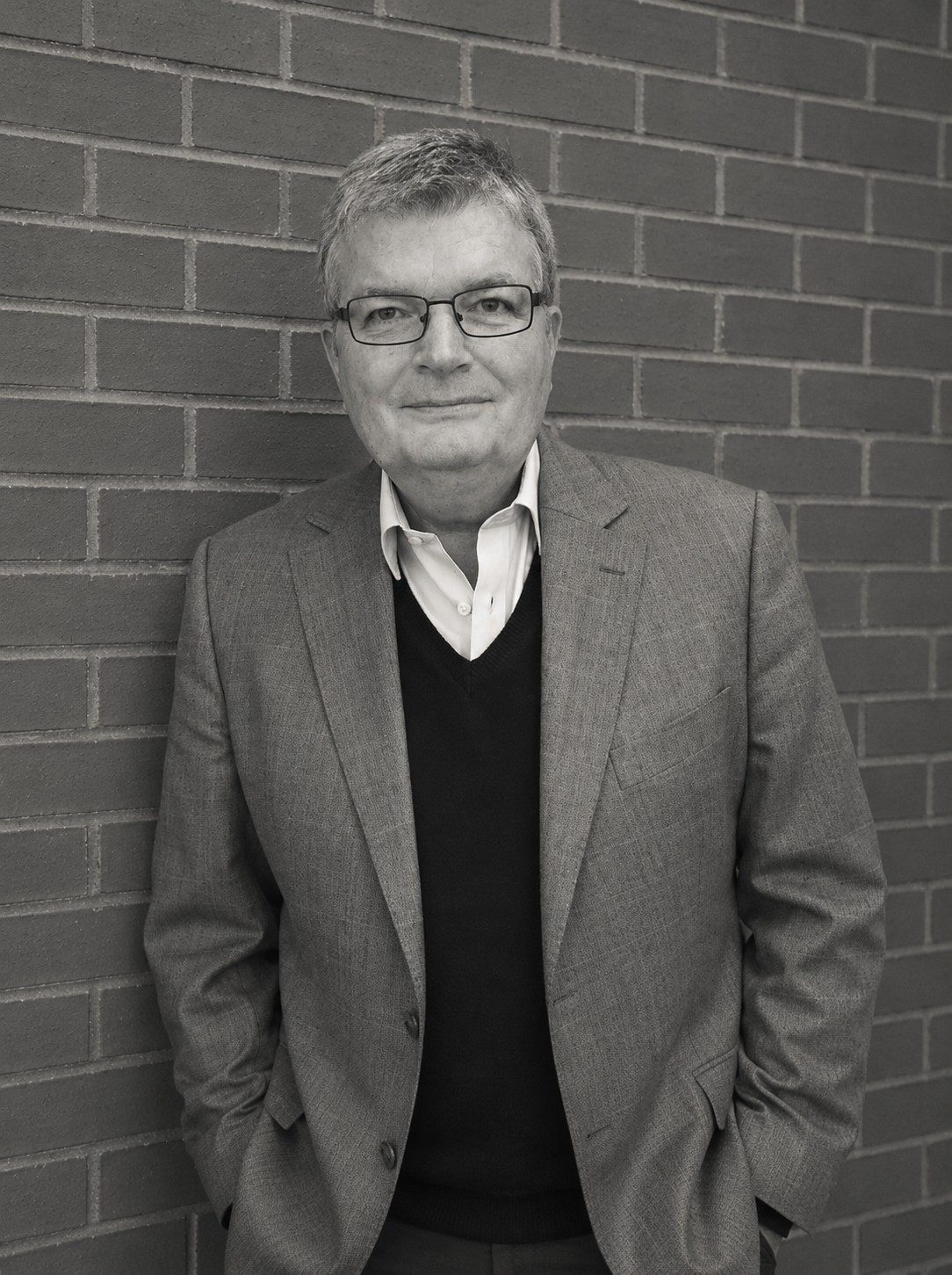 Philip Howell with wall in background
